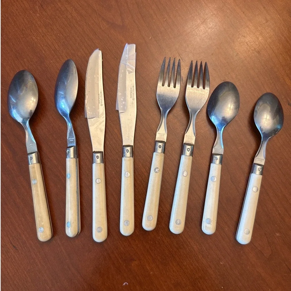 Mardi‎ Gras Korea Stainless silverware 2 sets w 4 pieces ea ivory midcentury vtg